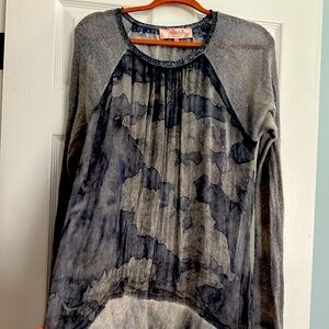 long sleeve casual or dressy top . variations of grey.